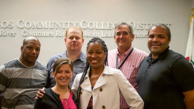 Several district employees standing together