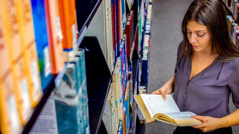 A CRC student in the library