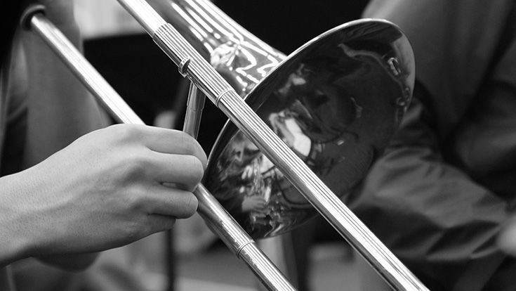 Black and white close-up photo of a trombone